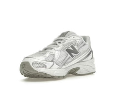 حذاء نيو بالانس 740v2 أبيض فضي عاكس